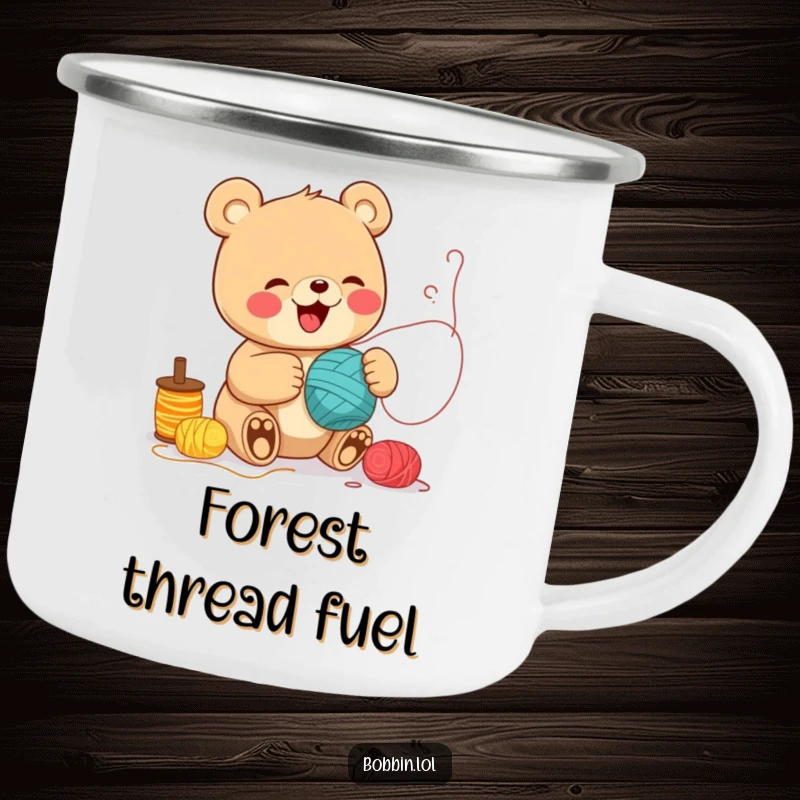 Funny Bear Sewing Camping Mug: A cheerful bear giggling while unspooling threads, perfect for outdoor crafting. Super funny gift.