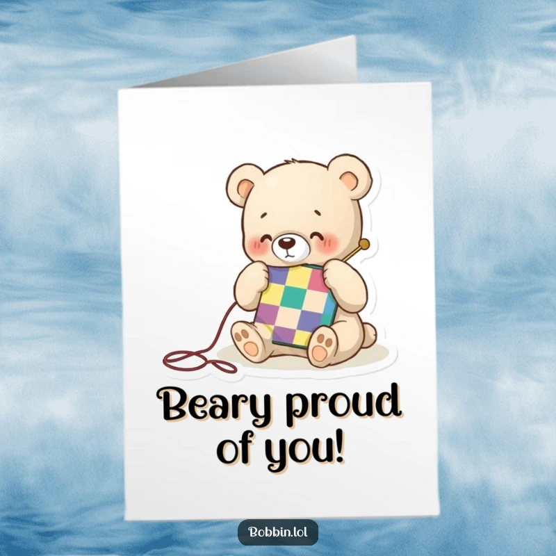 Funny Free Printable Congratulations Card: A tiny bear happily stitches a colorful quilt square, celebrating a win.